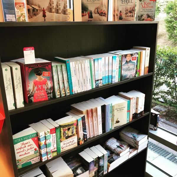 a book shelf filled with books
